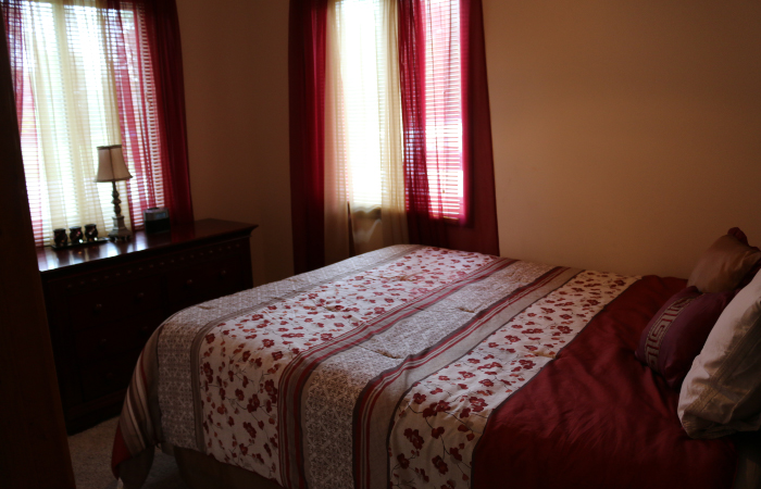 bedroom, red curtains